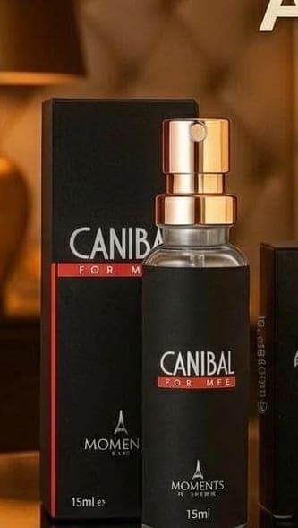 Frasco e caixa do perfume de bolso Canibal da Moments Paris, fragrância frutal e chipre.