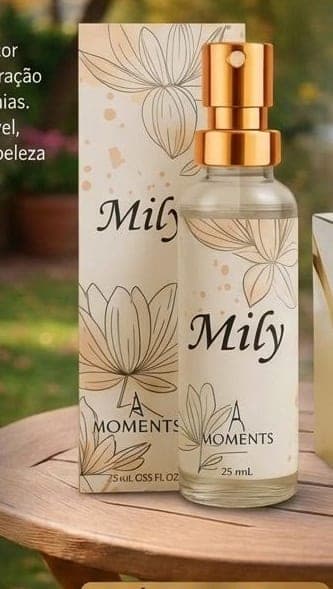 Frasco e caixa do perfume de bolso Mily da Moments Paris, fragrância floral.