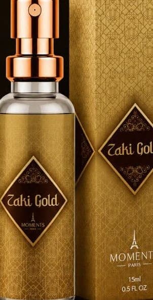 Frasco e caixa do perfume de bolso Zaki Gold da Moments Paris, fragrância árabe e ambarado e especiado.
